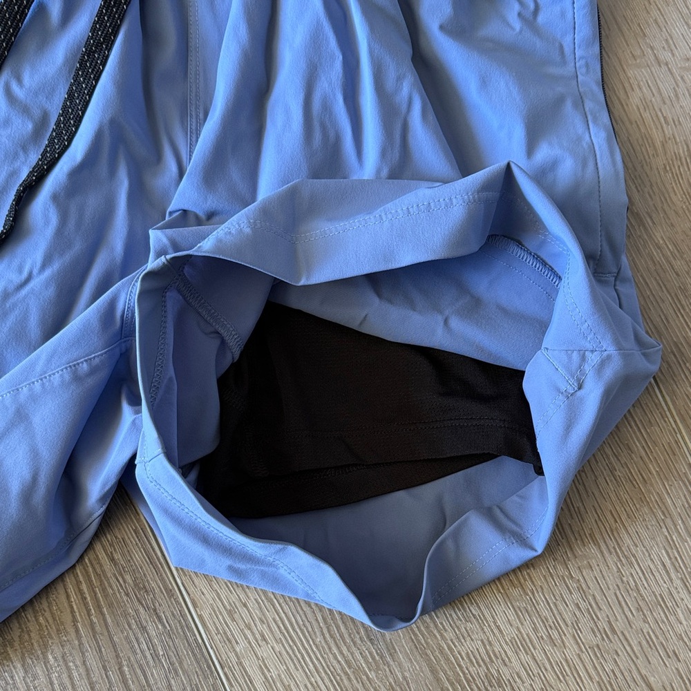 Fabletics Men's Athletic Lined Shorts Trio - Blue, Black, Beige - Picture 14 of 15